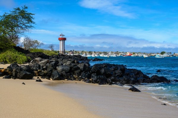 The lighthouse in San Cristobal, Mann Beach The lighthouse in San Cristobal, Mann Beach