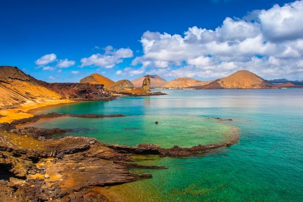 Volcanic landscape on Bartolome Island on the coast Volcanic landscape on Bartolome Island on the coast