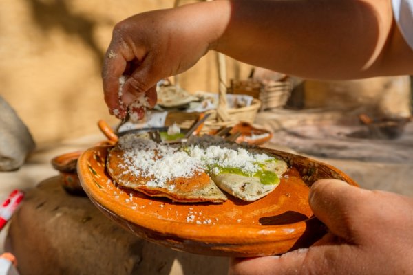 best food to try in Mexico corn tlacoyo with beans and salsa best food to try in Mexico corn tlacoyo with beans and salsa