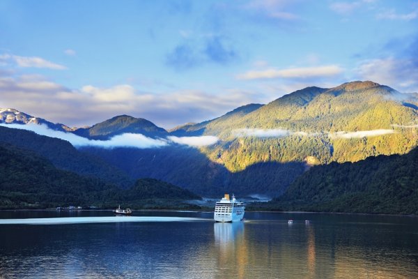 Cruise ship sailing the Chilean Fjords Cruise ship sailing the Chilean Fjords