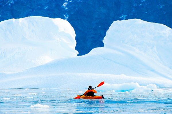 Kayaking between the icebergs shutterstock 1572230845 By Adwo 800