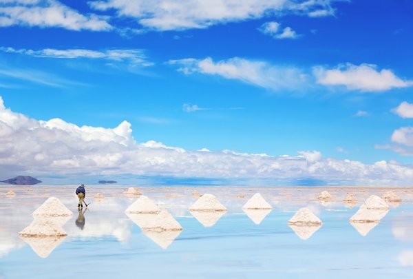Working man in Salt Flats, Bolivia Working man in Salt Flats, Bolivia