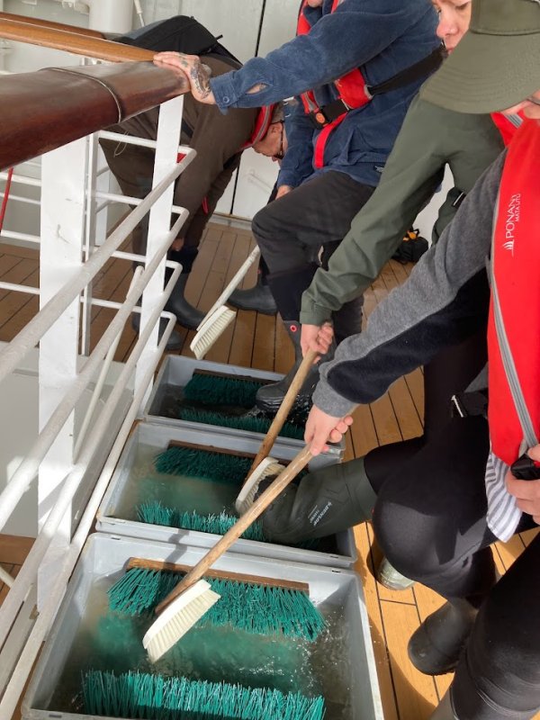 Boot cleaning before Island landing Boot cleaning before Island landing