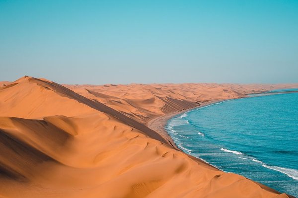 Desert Mirage Namibia's Surreal Sands Embrace the Sea Desert Mirage Namibias Surreal Sands Embrace the Sea