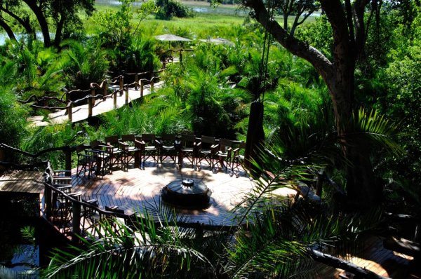 The evening bonfire spot in one of the delta’s luxury camps. Travel to Africa and experience luxy lodges of Delta