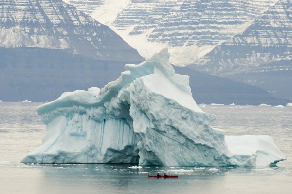 Kayaking between icebergs shutterstock 403776787 By Adwo 800