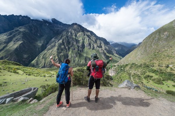 Two people hiking the Inca Trail to Machu Picchu, Peru Two people hiking the Inca Trail to Machu Picchu, Peru