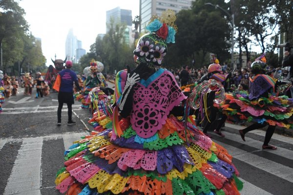 Day of the Dead parade at one of the main avenues of Mexico City Day of the Dead parade at one of the main avenues of Mexico City
